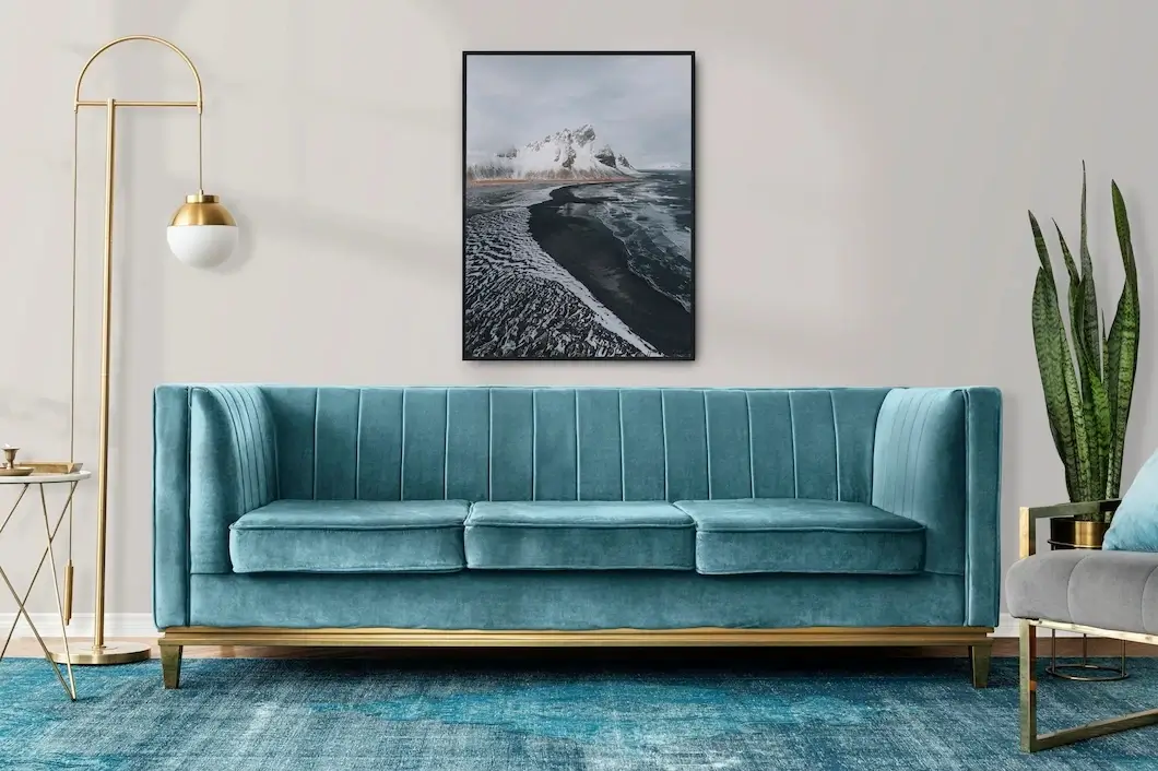 Blue sofa with an wall art